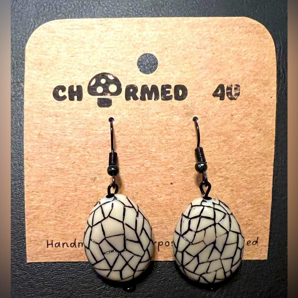 Gray earrings with black crackle detail.  Black hardware